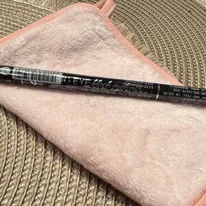 Black Eyeliner with Pink Makeup Cloth